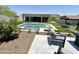 Stunning pool and spa with spacious patio and outdoor kitchen at 27222 N 64Th Dr, Phoenix, AZ 85083