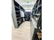 Large walk-in closet with ample shelving and hanging space at 27222 N 64Th Dr, Phoenix, AZ 85083