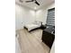 Comfortable bedroom with queen bed and wood flooring at 27222 N 64Th Dr, Phoenix, AZ 85083