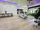 Open concept living area with hardwood floors at 27222 N 64Th Dr, Phoenix, AZ 85083