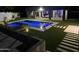 Stunning pool and patio with artificial turf and modern lighting at 27222 N 64Th Dr, Phoenix, AZ 85083