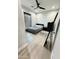 Spacious bedroom with a queen bed and large mirror at 27222 N 64Th Dr, Phoenix, AZ 85083