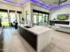 Open concept kitchen with a large island and breakfast bar, overlooking the living room at 27222 N 64Th Dr, Phoenix, AZ 85083