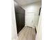 Bright hallway with modern storage and flooring at 27222 N 64Th Dr, Phoenix, AZ 85083