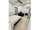 Spacious bedroom with light flooring and ensuite bathroom at 27222 N 64Th Dr, Phoenix, AZ 85083