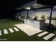 Modern outdoor kitchen with built-in grill under a pergola at 27222 N 64Th Dr, Phoenix, AZ 85083