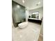 Elegant bathroom boasting a free-standing tub and modern fixtures at 27222 N 64Th Dr, Phoenix, AZ 85083