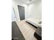 Modern bedroom with light wood flooring and built-in closet at 27222 N 64Th Dr, Phoenix, AZ 85083