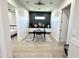 Home office with built-in desk and view to bedroom at 27222 N 64Th Dr, Phoenix, AZ 85083