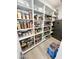 Well-organized pantry with ample shelving at 27222 N 64Th Dr, Phoenix, AZ 85083