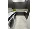 Modern laundry room with washer, dryer, and ample cabinetry at 27222 N 64Th Dr, Phoenix, AZ 85083