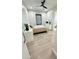 Bright bedroom with queen bed and wood floors at 27222 N 64Th Dr, Phoenix, AZ 85083
