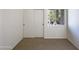 Small bedroom with double sliding doors and a window at 7417 N Via Camello Del Norte -- # 160, Scottsdale, AZ 85258
