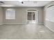 Bright living room featuring tile floors and sliding glass doors at 2150 W Alameda Rd # 1250, Phoenix, AZ 85085