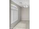 Simple dining room with tile floor and large window at 2150 W Alameda Rd # 1250, Phoenix, AZ 85085