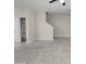 Living room with tile floors and a staircase at 2150 W Alameda Rd # 1250, Phoenix, AZ 85085