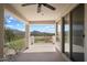 Covered patio with mountain views and sliding glass door at 43908 N 10Th St, New River, AZ 85087