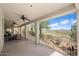 Covered patio with mountain views and ceiling fans at 43908 N 10Th St, New River, AZ 85087