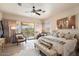 Main bedroom with access to a balcony and views of the surrounding landscape at 43908 N 10Th St, New River, AZ 85087