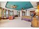 Main bedroom with ornate bed, sitting area and views at 1402 E Coral Cove Dr, Gilbert, AZ 85234