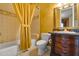 Clean bathroom with a tub, shower, and updated vanity at 1402 E Coral Cove Dr, Gilbert, AZ 85234