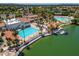 Large community pool and clubhouse with lake access at 1402 E Coral Cove Dr, Gilbert, AZ 85234