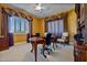 Home office with built-in cabinetry and ample workspace at 1402 E Coral Cove Dr, Gilbert, AZ 85234