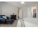 Bedroom with leather chair and ottoman, offering a cozy atmosphere at 1402 E Coral Cove Dr, Gilbert, AZ 85234