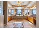 Spa-like bathroom with large soaking tub and dual vanities at 1402 E Coral Cove Dr, Gilbert, AZ 85234