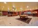 Game room in the basement, featuring a pool table and a wet bar at 1402 E Coral Cove Dr, Gilbert, AZ 85234