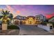 Grand two-story home with large driveway and landscaping at 1402 E Coral Cove Dr, Gilbert, AZ 85234