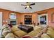 Relaxing living room with a fireplace and comfortable seating at 1402 E Coral Cove Dr, Gilbert, AZ 85234