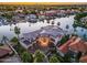 Luxury waterfront home with expansive canal views at sunset at 1402 E Coral Cove Dr, Gilbert, AZ 85234