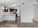 Modern kitchen with dark cabinets and stainless steel appliances at 6447 W Escuda Rd, Glendale, AZ 85308
