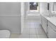 Bathroom with a toilet, bathtub, and double vanity at 6447 W Escuda Rd, Glendale, AZ 85308