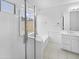 Bathroom with a shower, bathtub, and double vanity at 6447 W Escuda Rd, Glendale, AZ 85308