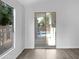 Bright living room with sliding glass doors leading to a pool at 6447 W Escuda Rd, Glendale, AZ 85308