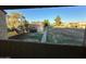 View of the community from a balcony, showcasing green spaces and residential buildings at 6337 N 49Th Ave, Glendale, AZ 85301