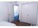 Bedroom with double door closets and view of the upstairs loft at 6337 N 49Th Ave, Glendale, AZ 85301