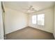 Bedroom with ceiling fan and window at 14300 W Bell Rd # 444, Surprise, AZ 85374