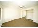 Bright bedroom with ceiling fan and mirrored closet at 14300 W Bell Rd # 444, Surprise, AZ 85374