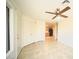 Bright entryway with tile flooring, a console table, and framed artwork at 14300 W Bell Rd # 444, Surprise, AZ 85374