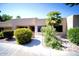 Tan stucco exterior with a walkway and landscaping at 14300 W Bell Rd # 444, Surprise, AZ 85374