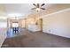 Bright dining room with hardwood floors and a view to the kitchen at 10649 W Monte Vista Rd, Avondale, AZ 85392