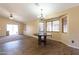 Bright dining room with wood flooring and large windows at 10649 W Monte Vista Rd, Avondale, AZ 85392