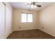 Bedroom with double door closet and neutral wall colors at 10649 W Monte Vista Rd, Avondale, AZ 85392
