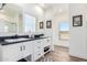 Modern bathroom with double vanity and a walk-in shower at 900 N Windy Meadow Ln, Maricopa, AZ 85139