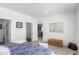 Spacious bedroom with a view into the bathroom and a walk-in closet at 900 N Windy Meadow Ln, Maricopa, AZ 85139
