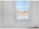 Bedroom window showcasing a view of the landscape at 900 N Windy Meadow Ln, Maricopa, AZ 85139
