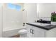Clean bathroom with bathtub, toilet and sink at 900 N Windy Meadow Ln, Maricopa, AZ 85139